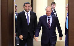 Saad Hariri y Vladimir Putin. Foto: AFP.