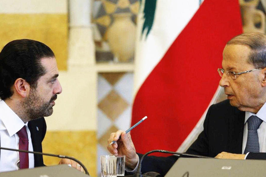 El primer ministro designado, Saad Hariri (I), habla con el presidente libanés, Michel Aoun (D). Foto: AFP.