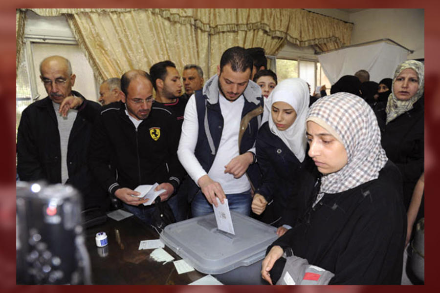 Votantes en escuela de Damasco (Foto SANA).