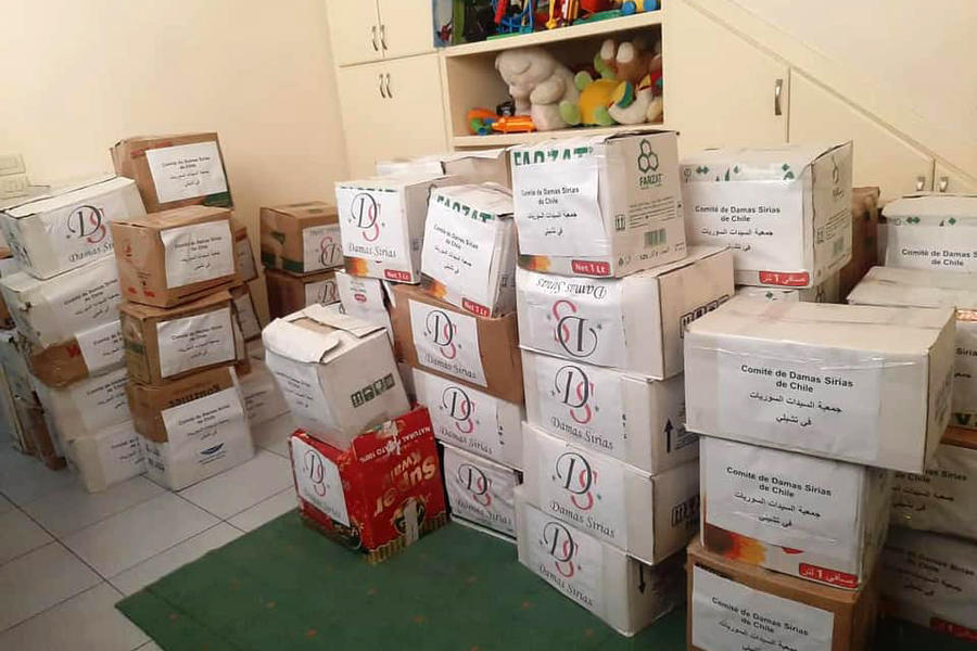 Las cajas de asistencia fueron recibidas y distribuidas por la OSDC en Homs (Foto: Damas Sirias)